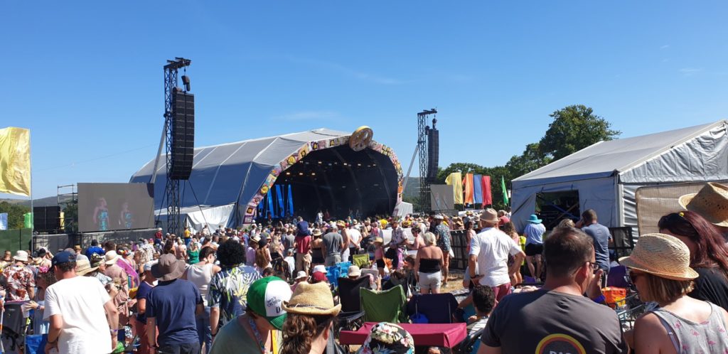 Main Castle Stage crowd, mid-afternoon on Friday 29 July 2022 — try finding a space to sit amongst this